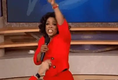 Oprah Winfrey pointing at everyone (you get a prize!)