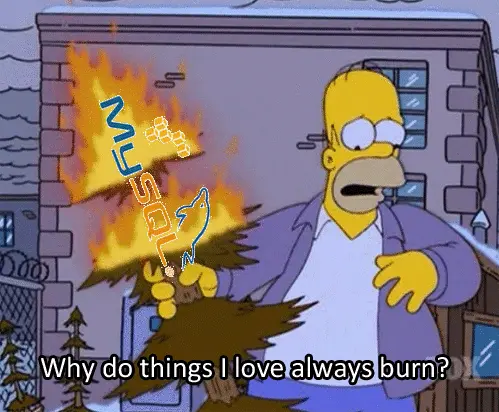 Homer Simpson, holding a burning Chrismas tree, with the caption "Why do the things I love always burn?". The MySQL logo overlies the tree.